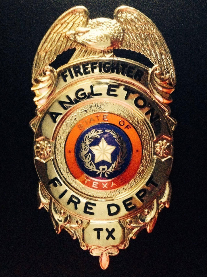 Angleton Volunteer Fire Department Badge A firefighter badge worn about the Angleton Volunteer Fire Department.