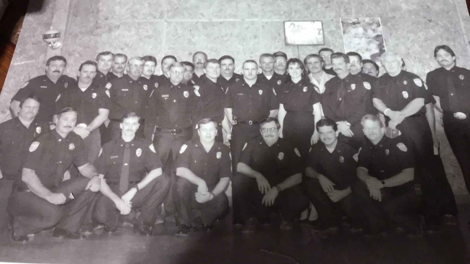 Firefighters Posing in Dark Uniforms Firefighters posing in dark uniforms to keep the record of the department's history alive.