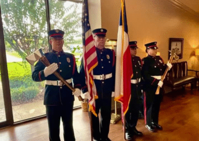 Angleton Volunteer Fire Department firefighters standing at attention dressed in official uniforms
